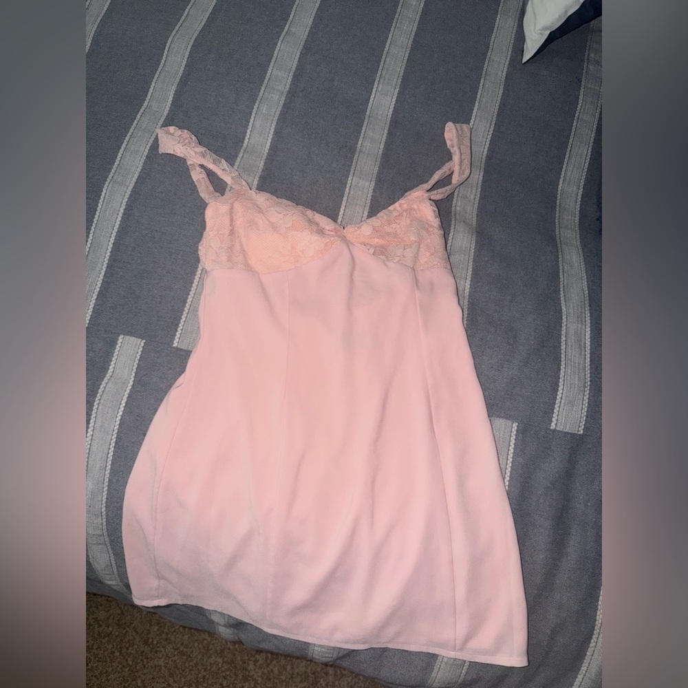 White fox pink mini dress with lace detailing.